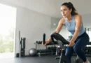 A person doing a controlled high-intensity interval training workout on a stationary bike.